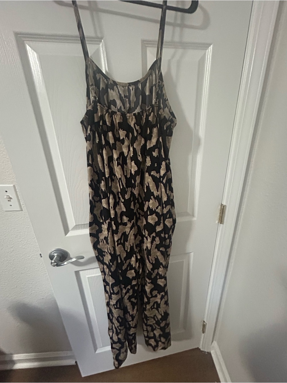 Sleeveless Black and Tan Animal Print Jumpsuit